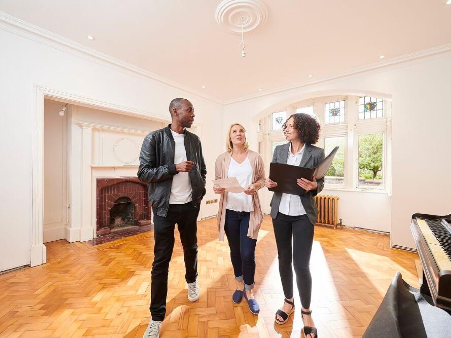 Couple being shown new home.